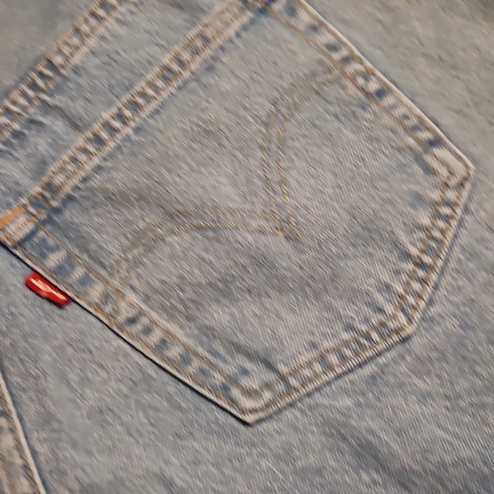 Levi's Light Blue Frayed Denim Cutoff Shorts Size 31 High Rise
